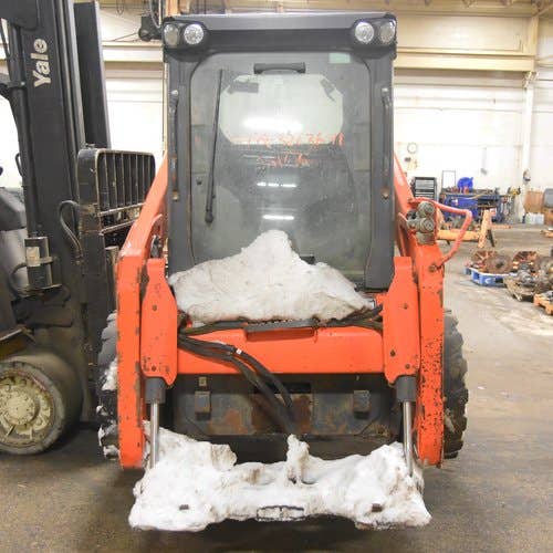 Used Kubota SSV65 Skid Steer Loader parts.