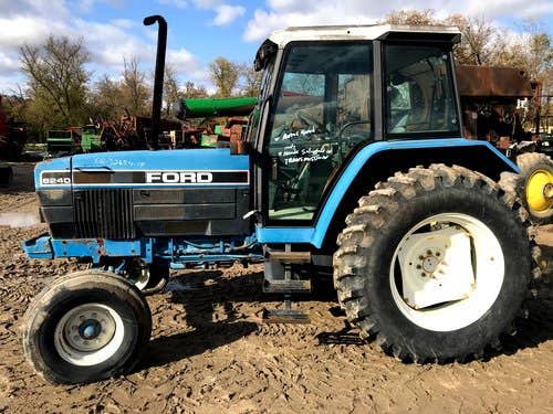 Used New Holland 8240 Tractor parts.