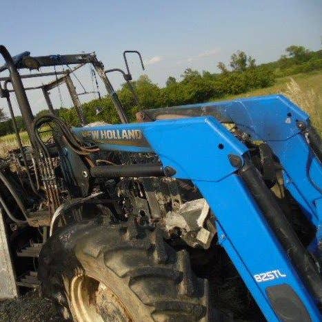 Used New Holland 825TL Loader / Backhoe Attachments parts.