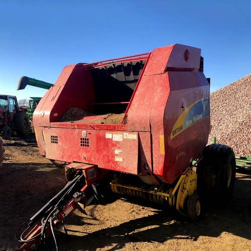 Used New Holland BR7090 Baler parts.