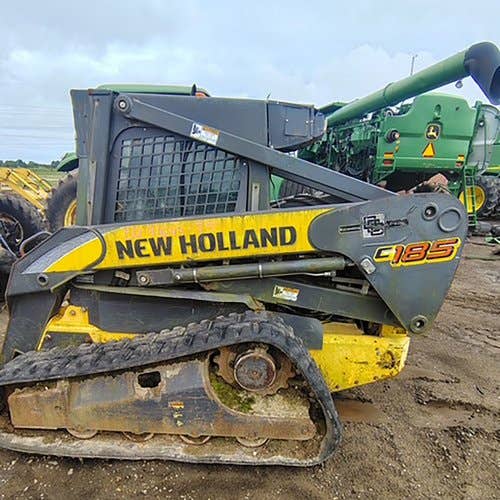 Used New Holland C185 Skid Steer Loader parts.