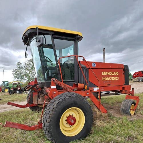 Used New Holland HW320 Hay Cutting parts.