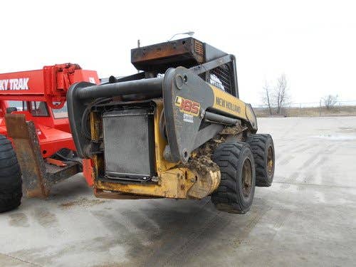 Used New Holland L185 Skid Steer Loader parts.