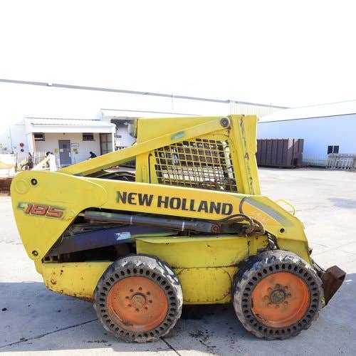 Used New Holland l185 Skid Steer Loader parts.