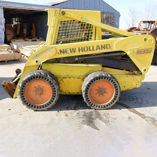 Used New Holland l185 Skid Steer Loader parts.