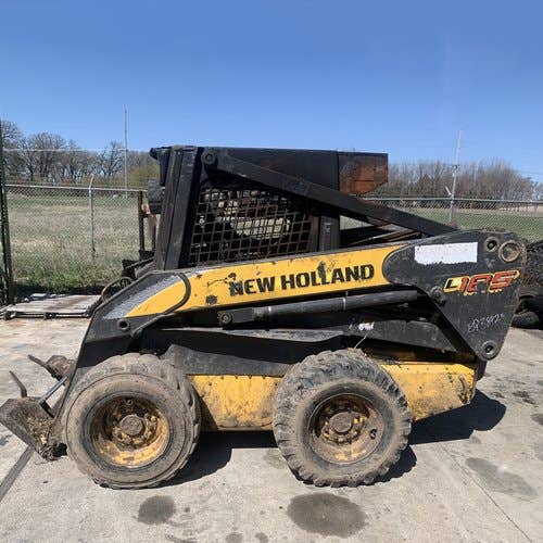 Used New Holland L185 Skid Steer Loader parts.