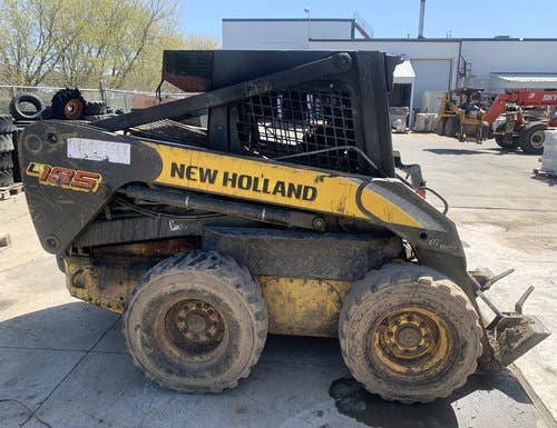 Used New Holland L185 Skid Steer Loader parts.