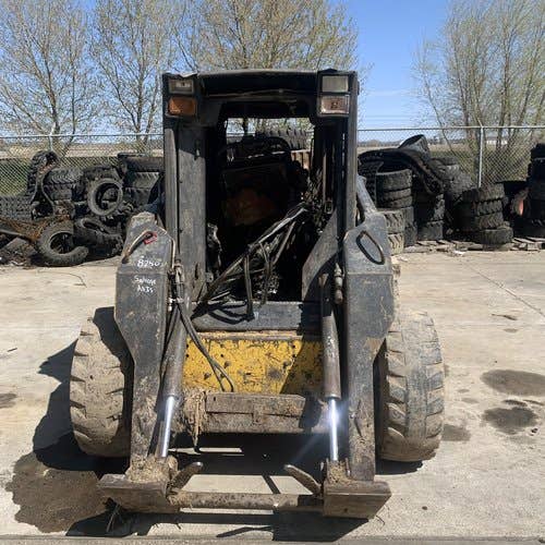 Used New Holland L185 Skid Steer Loader parts.