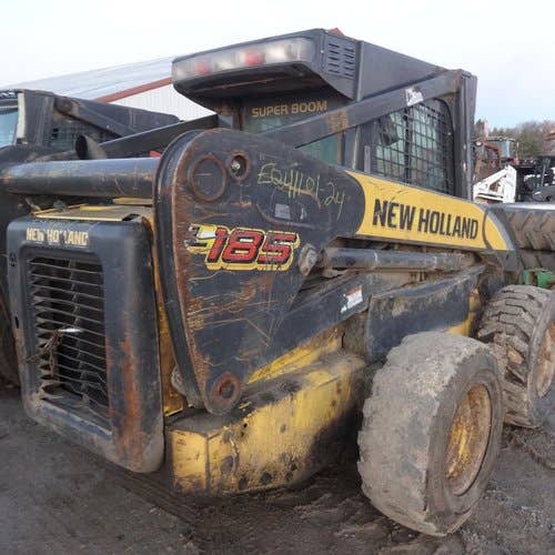 Used New Holland L185 Skid Steer Loader parts.
