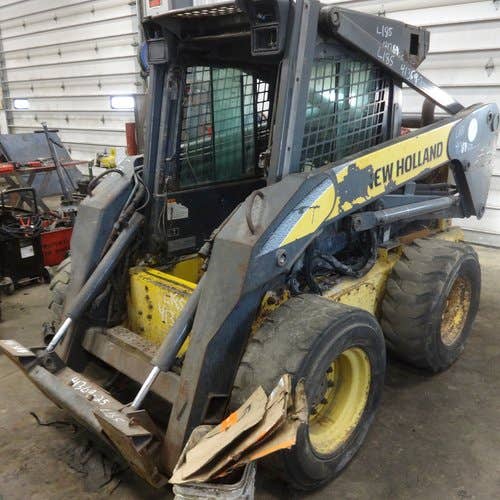 Used New Holland l185 Skid Steer Loader parts.