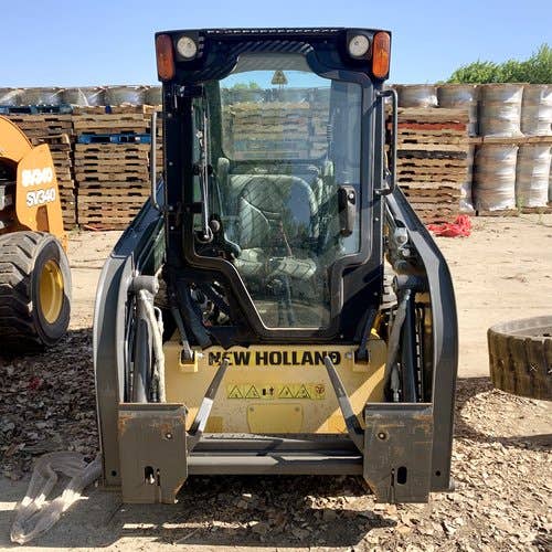 Used New Holland L215 Skid Steer Loader parts.