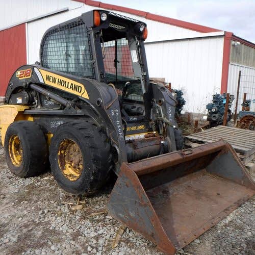 Used New Holland L218 Skid Steer Loader parts.