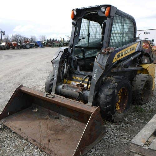 Used New Holland L218 Skid Steer Loader parts.
