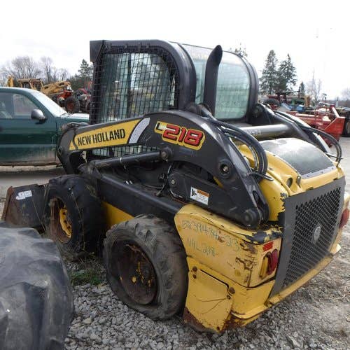 Used New Holland L218 Skid Steer Loader parts.