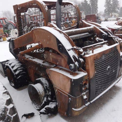 Used New Holland L218 Skid Steer Loader parts.