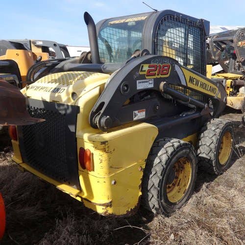 Used New Holland L218 Skid Steer Loader parts.