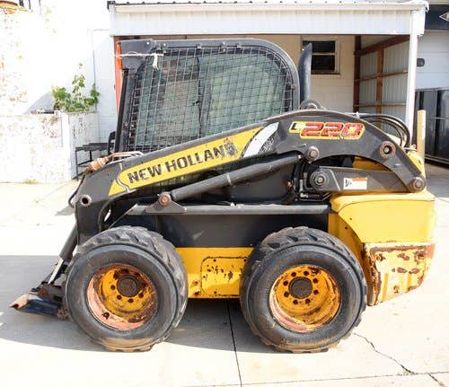 Used New Holland L220 Skid Steer Loader parts.