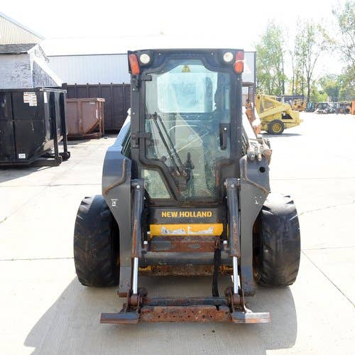 Used New Holland L220 Skid Steer Loader parts.