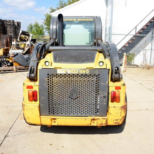 Used New Holland L220 Skid Steer Loader parts.