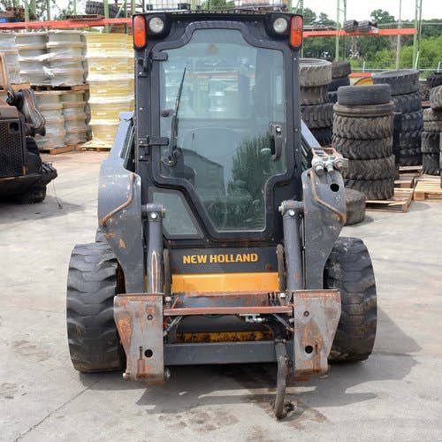 Used New Holland l220 Skid Steer Loader parts.