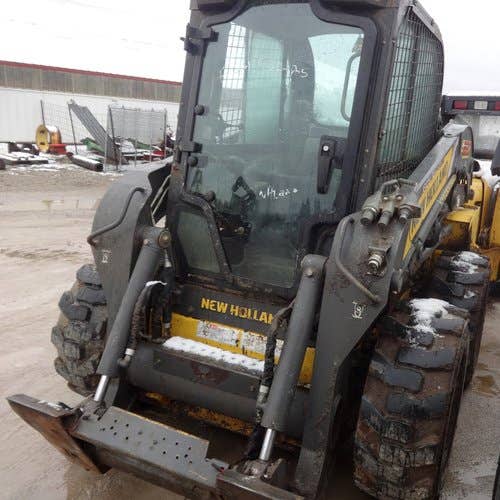 Used New Holland L220 Skid Steer Loader parts.