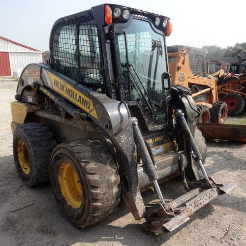 Used New Holland l220 Skid Steer Loader parts.