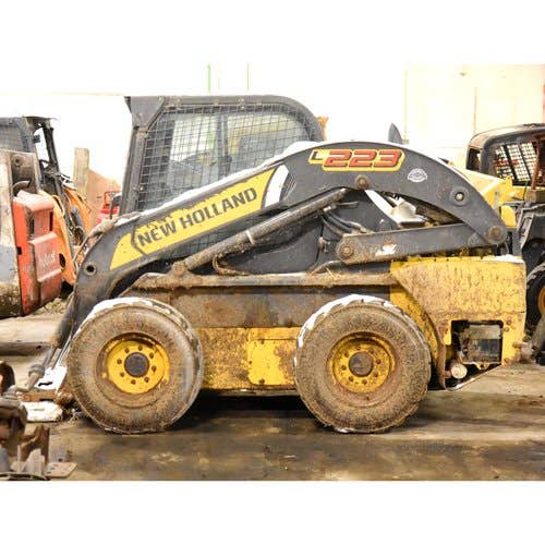 Used New Holland L223 Skid Steer Loader parts.