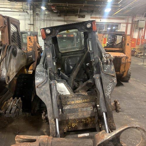 Used New Holland l225 Skid Steer Loader parts.