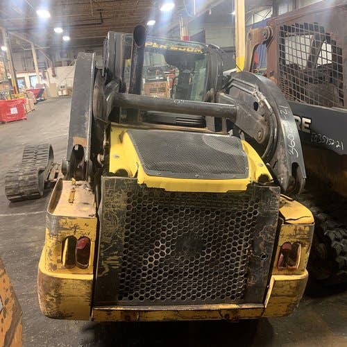 Used New Holland l225 Skid Steer Loader parts.