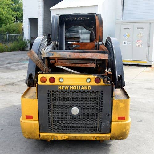 Used New Holland L228 Skid Steer Loader parts.