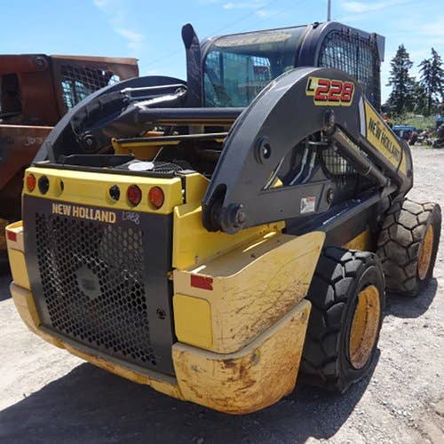 Used New Holland L228 Skid Steer Loader parts.