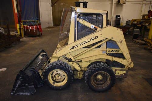 Used New Holland L425 Skid Steer Loader parts.