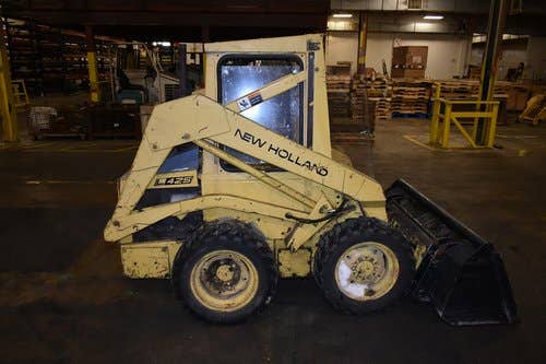Used New Holland L425 Skid Steer Loader parts.