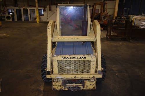 Used New Holland L425 Skid Steer Loader parts.