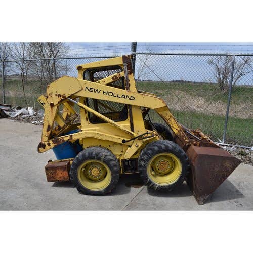 Used New Holland L425 Skid Steer Loader parts.