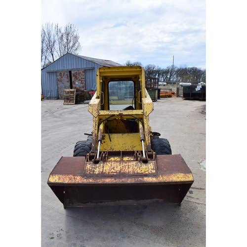 Used New Holland L425 Skid Steer Loader parts.