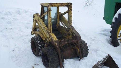 Used New Holland l445 Skid Steer Loader parts.