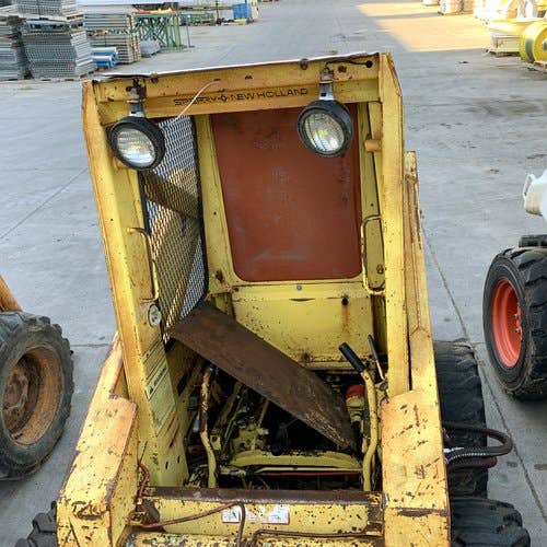 Used New Holland L445 Skid Steer Loader parts.