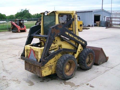 Used New Holland L452 Skid Steer Loader parts.