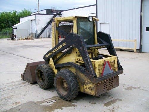 Used New Holland L452 Skid Steer Loader parts.