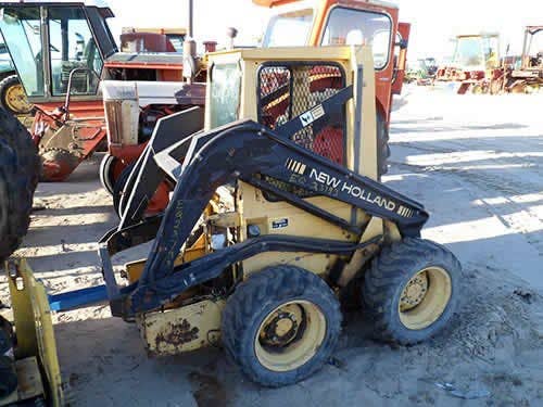 Used New Holland L455 Skid Steer Loader parts.