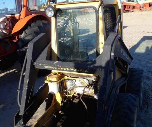 Used New Holland L455 Skid Steer Loader parts.