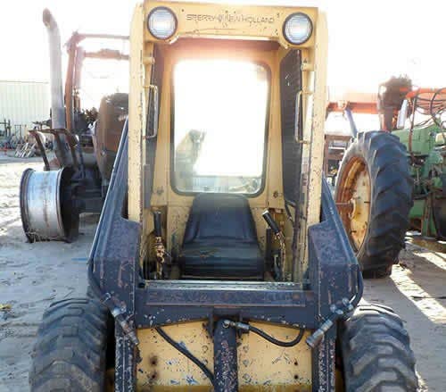 Used New Holland L455 Skid Steer Loader parts.