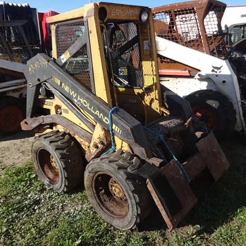 Used New Holland L455 Skid Steer Loader parts.