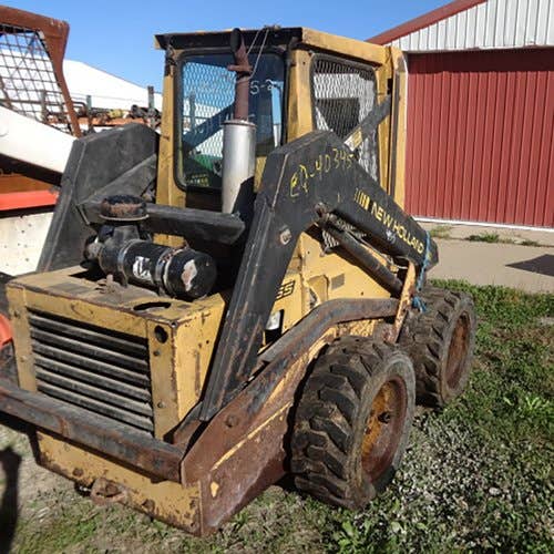 Used New Holland L455 Skid Steer Loader parts.