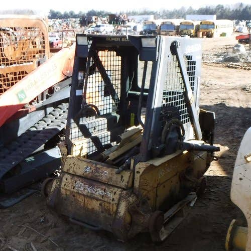 Used New Holland L465 Skid Steer Loader parts.