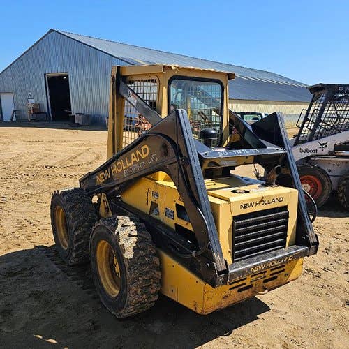 Used New Holland L553 Skid Steer Loader parts.