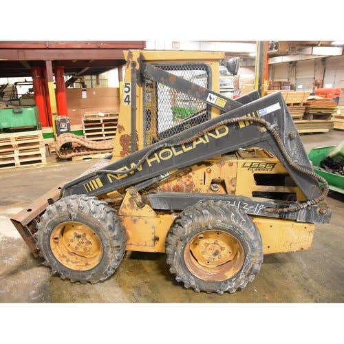 Used New Holland L555 Skid Steer Loader parts.