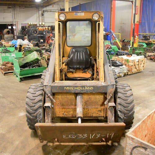 Used New Holland L555 Skid Steer Loader parts.