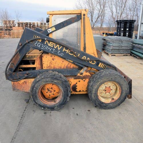 Used New Holland l555 Skid Steer Loader parts.